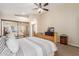 Bright main bedroom with neutral tones and mirror closet doors for added space at 32 E Dawn Dr, Tempe, AZ 85284