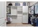 Walk-in closet with built-in shelving and ample storage space at 3234 N 163Rd Dr, Goodyear, AZ 85395