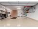 Spacious garage offers ample storage, epoxy flooring, and room for multiple vehicles and equipment, for organized parking at 3234 N 163Rd Dr, Goodyear, AZ 85395