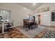 Bright dining area featuring neutral walls, unique flooring, and ample natural light, perfect for gatherings at 3299 E Boston St, Gilbert, AZ 85295