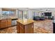 Kitchen island overlooking the living room with lots of natural light at 3299 E Boston St, Gilbert, AZ 85295