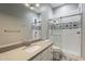 A stylish bathroom with subway tiled shower, decorative accent tiles, and a modern vanity with lots of light at 3373 E Oriole Way, Chandler, AZ 85286