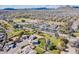 Aerial view showcases the community with easy access to amenities and beautiful mountain views at 34969 N Open Range Dr, San Tan Valley, AZ 85144