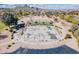 Community basketball court is perfect for a game of hoops with friends and Gathering under the bright, sunny sky at 34969 N Open Range Dr, San Tan Valley, AZ 85144