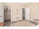 Bedroom showcasing a walk-in closet and a neutral color scheme for a serene and organized space at 34969 N Open Range Dr, San Tan Valley, AZ 85144