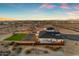 Wide aerial view of the property featuring a spacious backyard, artificial turf, and desert landscape at 35150 N Bell Rd, Queen Creek, AZ 85144