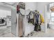 Spacious closet featuring custom organization, clothing racks, and direct access to the bathroom at 35150 N Bell Rd, Queen Creek, AZ 85144