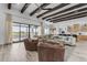 Open-concept living room with sliding glass doors leading to the backyard and a view of the playground at 35150 N Bell Rd, Queen Creek, AZ 85144