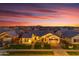 Beautiful single-story home in a suburban community featuring desert landscaping and a colorful twilight sky at 3547 E Bloomfield Pkwy, Gilbert, AZ 85296