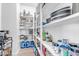 Well-organized walk-in pantry with ample shelving for food storage and kitchen essentials at 3547 E Bloomfield Pkwy, Gilbert, AZ 85296