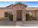 Inviting front entrance with stone accents and a cozy bench at 3663 E Camden Ave, San Tan Valley, AZ 85140