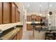 Updated kitchen featuring stainless steel appliances and granite countertops at 3663 E Camden Ave, San Tan Valley, AZ 85140