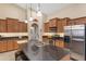 Modern kitchen with stainless steel appliances, dark countertops, and pendant lighting at 3663 E Camden Ave, San Tan Valley, AZ 85140