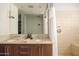 The bathroom has a double vanity, a large mirror, and a shower/tub combination at 4745 N Scottsdale Rd # 3008, Scottsdale, AZ 85251