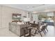 Inviting living room with a view of the pool and sliding glass doors at 5142 N 205Th Gln, Buckeye, AZ 85396