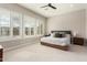 Serene bedroom with neutral tones, plantation shutters, and plush carpeting for a relaxing atmosphere at 5700 N 202Nd Ln, Litchfield Park, AZ 85340