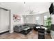 Inviting living area featuring stylish gray sofa, area rug and a modern ceiling fan at 605 S Roosevelt St, Tempe, AZ 85281