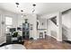 Open living room with a wine rack and a staircase, offering seamless transitions and ample space at 605 S Roosevelt St, Tempe, AZ 85281