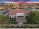 Overhead view of the beautiful property showing the outdoor area, landscaping, and the surrounding neighborhood at 610 W Tonto Dr, Chandler, AZ 85248