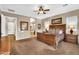 Spacious main bedroom with neutral tones, large windows, and a luxurious ensuite bathroom at 610 W Tonto Dr, Chandler, AZ 85248