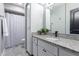 Bathroom featuring a granite counter, white cabinets, and shower with curtain at 6338 E Camelot Dr, Mesa, AZ 85215