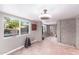 Bonus room with neutral colors, decorative ceiling light, and tile floor at 6338 E Camelot Dr, Mesa, AZ 85215