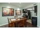 Charming dining space connects the kitchen with stainless steel appliances, creating an inviting flow at 7350 N Via Paseo Del Sur -- # N108, Scottsdale, AZ 85258