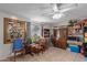 Bright dining area featuring a ceiling fan and tiled floors at 765 S Geronimo Rd, Apache Junction, AZ 85119