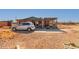 Exterior view of home with driveway and desert landscaping at 765 S Geronimo Rd, Apache Junction, AZ 85119