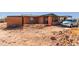 Exterior view of house with desert landscaping and driveway at 765 S Geronimo Rd, Apache Junction, AZ 85119