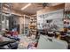 Spacious garage featuring a pegboard for tools, shelving, and plenty of room for storage at 765 S Geronimo Rd, Apache Junction, AZ 85119