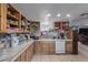 Practical kitchen with tile countertops and ample cabinet space at 765 S Geronimo Rd, Apache Junction, AZ 85119