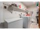 Laundry room featuring washer, dryer, storage shelf and freezer at 765 S Geronimo Rd, Apache Junction, AZ 85119