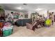 Inviting living room featuring neutral tile flooring and cozy seating at 765 S Geronimo Rd, Apache Junction, AZ 85119