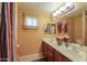 Bathroom with a double sink vanity, large mirror and decorative accents creating a functional, tidy space at 8715 S Valley Vista Ct, Casa Grande, AZ 85193