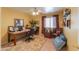 Comfortable home office featuring neutral colors and a ceiling fan at 8715 S Valley Vista Ct, Casa Grande, AZ 85193