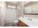 Bathroom featuring a shower over tub, single sink vanity, and neutral tones at 924 E Redondo Dr, Gilbert, AZ 85296