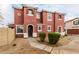 Beautiful terracotta two-story home with a tiled roof and manicured gravel landscaping at 924 E Redondo Dr, Gilbert, AZ 85296