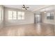 Living room with large windows, neutral paint, tile floors and a glass slider at 924 E Redondo Dr, Gilbert, AZ 85296