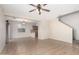 An open-concept living room that flows seamlessly into the kitchen with ceramic tile at 924 E Redondo Dr, Gilbert, AZ 85296