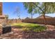 Backyard featuring block wall and mature trees at 9423 E Posada Ave, Mesa, AZ 85212