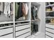 Organized walk-in closet with drawers, shelves, and hanging space at 10721 E Pampa Ave, Mesa, AZ 85212