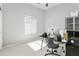 A functional home office equipped with a sleek desk, modern computer, and ample storage for efficient work at 10721 E Pampa Ave, Mesa, AZ 85212