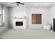 Bright living room with a decorative fireplace, mantle, a window seat, and recessed lighting, creating an inviting atmosphere at 10721 E Pampa Ave, Mesa, AZ 85212