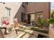 Private backyard showcasing a water feature, patio furniture, and a serene outdoor living space at 1153 E Muirwood Dr, Phoenix, AZ 85048