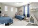 Cozy bedroom with two twin beds, decorative pillows, and a play tent, perfect for  at 1153 E Muirwood Dr, Phoenix, AZ 85048