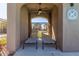 Relaxing pool cabana with lounge chairs and a ceiling fan at 1153 E Muirwood Dr, Phoenix, AZ 85048