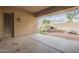 The covered patio provides an outdoor space for relaxing or entertaining with brick laid outdoor fireplace at 1154 E Kramer Cir, Mesa, AZ 85203