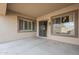 Covered patio with window and door access to yard and outdoor areas at 1154 E Kramer Cir, Mesa, AZ 85203