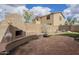 Spacious brick patio with a cozy outdoor fireplace, perfect for entertaining or enjoying tranquil evenings at 1154 E Kramer Cir, Mesa, AZ 85203